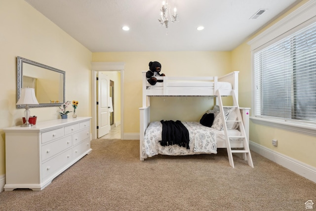 bedroom with baseboards, light carpet, visible vents, and recessed lighting