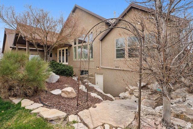 exterior space featuring stucco siding