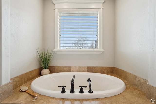 bathroom featuring a garden tub