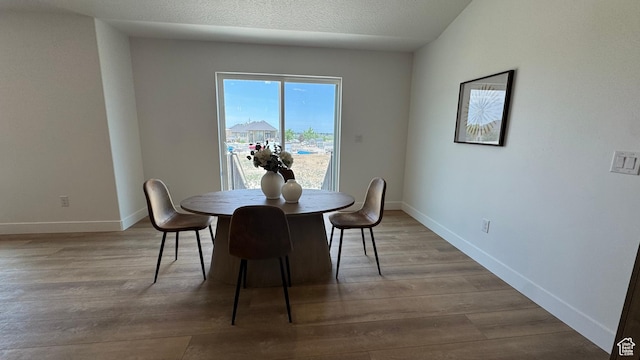427 E Redwood Ln Unit 120, Grantsville, UT 84029 - dining room featuring wood finished floors