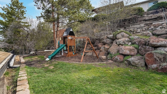 view of play area featuring a lawn