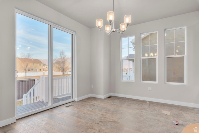 692 W Junegrass Ln, Stansbury Park, UT 84074 - unfurnished dining area with visible vents, baseboards, hardwood / wood-style floors, and a chandelier