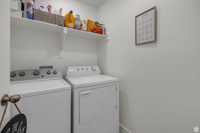 laundry area with washer and dryer and laundry area