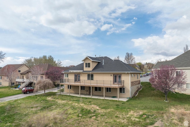 1278 E 530 N, American Fork, UT 84003 - rear view of property featuring a patio area and a lawn