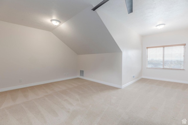 1278 E 530 N, American Fork, UT 84003 - bonus room with baseboards, vaulted ceiling, a textured ceiling, visible vents, and light colored carpet