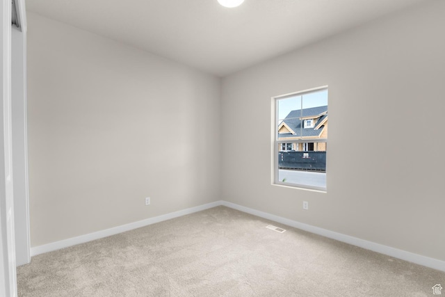 11838 S Golden Pine Ln, Riverton, UT 84065 - empty room featuring visible vents, baseboards, and carpet