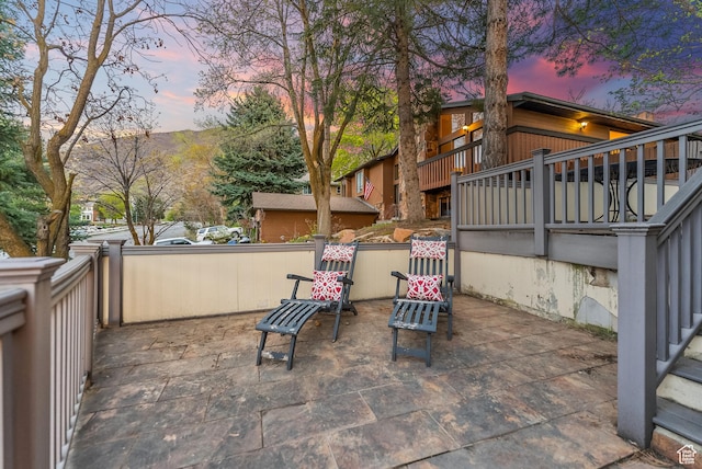 3338 E Creek Rd, Cottonwood Heights, UT 84121 - patio terrace at dusk featuring a patio area