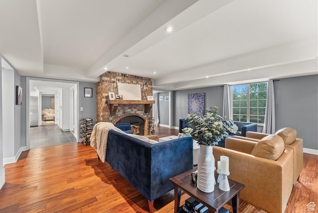 3338 E Creek Rd, Cottonwood Heights, UT 84121 - living area featuring wood-type flooring, a brick fireplace, recessed lighting, and beamed ceiling