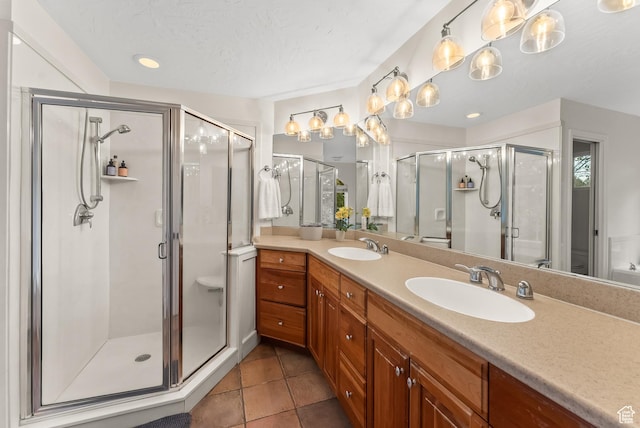 3338 E Creek Rd, Cottonwood Heights, UT 84121 - full bathroom featuring a shower stall, double vanity, and tile patterned floors
