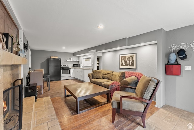 3338 E Creek Rd, Cottonwood Heights, UT 84121 - living room featuring a fireplace and recessed lighting