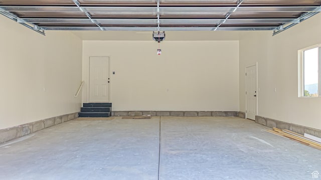 garage featuring a garage door opener