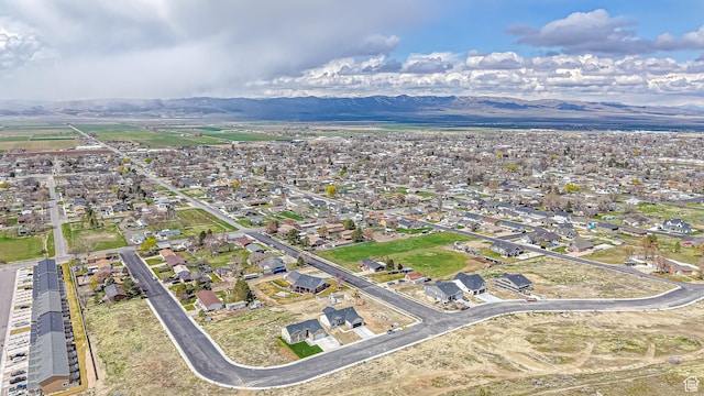aerial view with a mountain view and a residential view