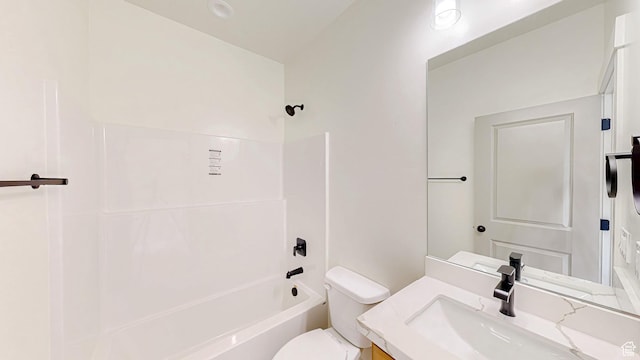 full bath with toilet, vanity, and tub / shower combination