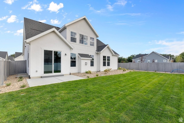 11888 S Golden Pine Ln, Riverton, UT 84065 - back of house with a patio, roof with shingles, stucco siding, a fenced backyard, and a lawn