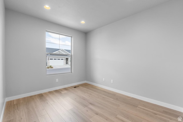 11888 S Golden Pine Ln, Riverton, UT 84065 - empty room featuring visible vents, light wood-style flooring, recessed lighting, and baseboards