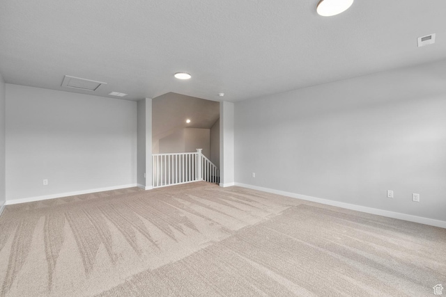 11888 S Golden Pine Ln, Riverton, UT 84065 - empty room featuring attic access, visible vents, baseboards, and carpet