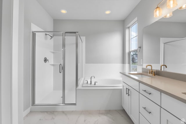 11888 S Golden Pine Ln, Riverton, UT 84065 - bathroom with double vanity, a shower stall, a bath, marble finish floor, and a sink