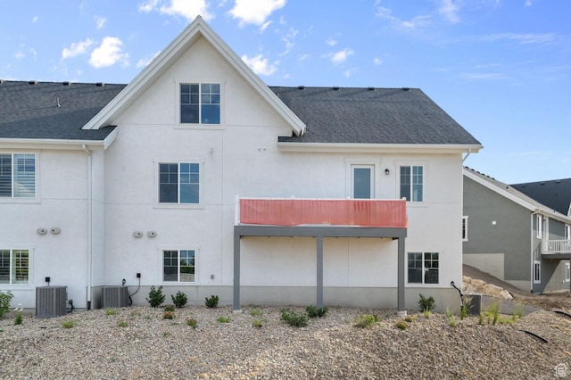 3622 W Harvest Gold Way, Riverton, UT 84065 - back of property featuring stucco siding, a shingled roof, and a balcony