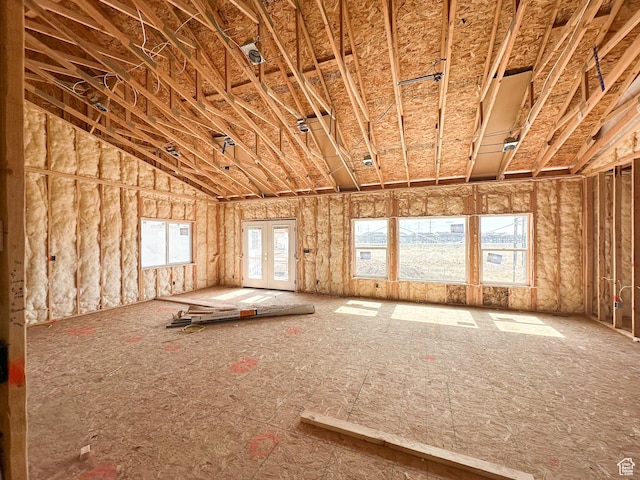 miscellaneous room with a healthy amount of sunlight and french doors