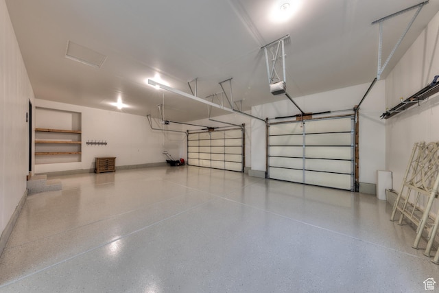 284 W Mcgill Blvd, Moab, UT 84532 - garage featuring a garage door opener and baseboards
