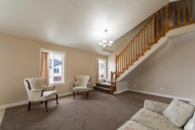 485 N 400 W, Tremonton, UT 84337 - living room featuring a healthy amount of sunlight, an inviting chandelier, carpet flooring, and stairway