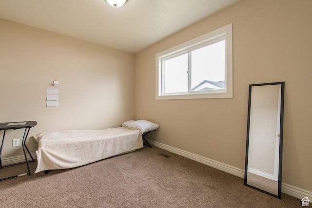 485 N 400 W, Tremonton, UT 84337 - bedroom with visible vents, baseboards, and carpet