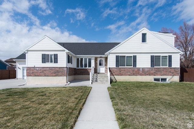 485 N 400 W, Tremonton, UT 84337 - ranch-style house featuring a front yard, fence, and brick siding