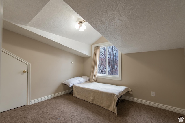 485 N 400 W, Tremonton, UT 84337 - bedroom with carpet floors, baseboards, a textured ceiling, and lofted ceiling