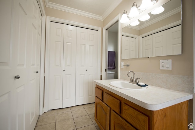 485 N 400 W, Tremonton, UT 84337 - bathroom with tile patterned floors, a closet, vanity, and ornamental molding