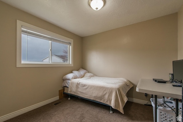 485 N 400 W, Tremonton, UT 84337 - bedroom featuring visible vents, baseboards, carpet, and a textured ceiling