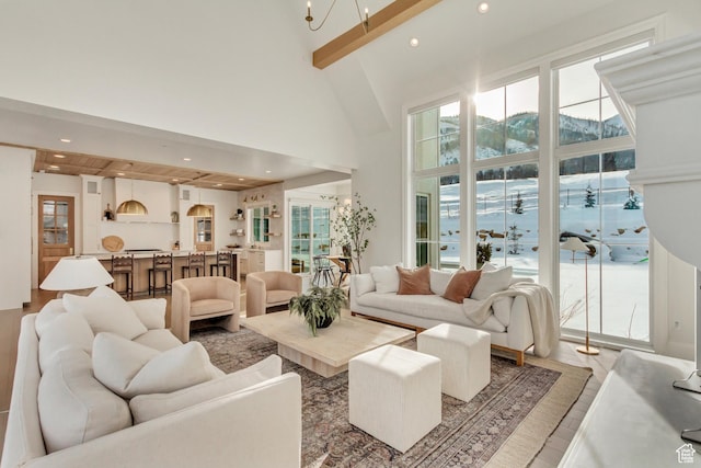 70 E Deer Meadow Ct, Woodland Hills, UT 84653 - living room featuring recessed lighting, plenty of natural light, beam ceiling, and a high ceiling
