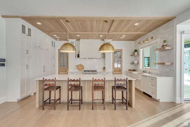 70 E Deer Meadow Ct, Woodland Hills, UT 84653 - kitchen featuring wood ceiling, open shelves, and light wood-type flooring