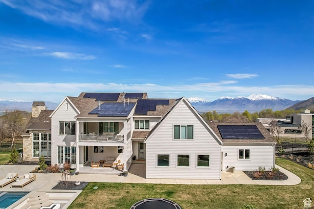 70 E Deer Meadow Ct, Woodland Hills, UT 84653 - back of house with a patio area, a balcony, and solar panels