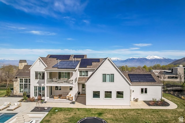70 E Deer Meadow Ct, Woodland Hills, UT 84653 - rear view of property featuring a patio area, a balcony, and solar panels