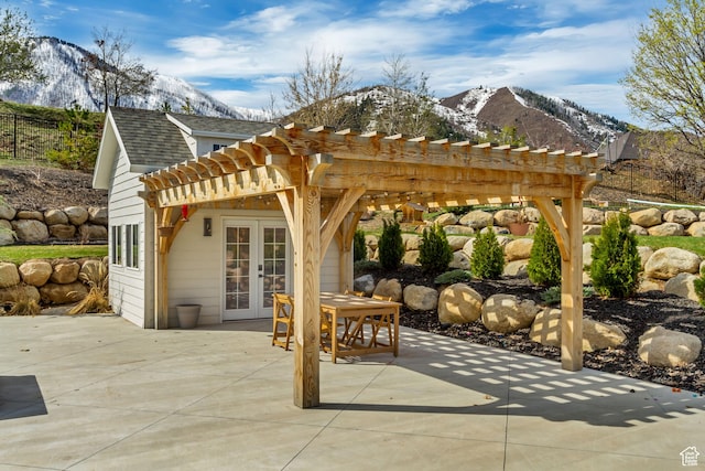70 E Deer Meadow Ct, Woodland Hills, UT 84653 - view of patio / terrace featuring a pergola, a mountain view, fence, and french doors