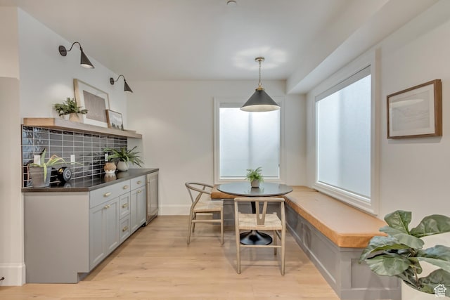 70 E Deer Meadow Ct, Woodland Hills, UT 84653 - dining area with light wood-type flooring and beverage cooler