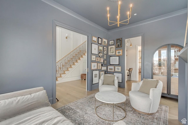 70 E Deer Meadow Ct, Woodland Hills, UT 84653 - living area with arched walkways, wood finished floors, an inviting chandelier, and stairs