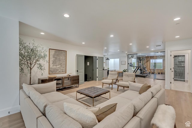 70 E Deer Meadow Ct, Woodland Hills, UT 84653 - living room with baseboards, recessed lighting, and light wood-style flooring
