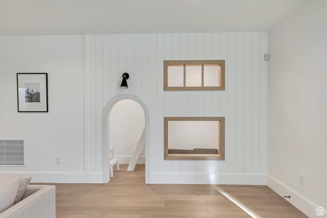 70 E Deer Meadow Ct, Woodland Hills, UT 84653 - unfurnished living room with wood finished floors, visible vents, and baseboards