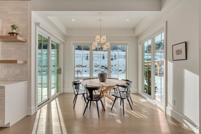 70 E Deer Meadow Ct, Woodland Hills, UT 84653 - dining area with baseboards, an inviting chandelier, and light wood-style flooring