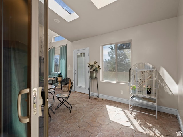 interior space featuring a skylight and a healthy amount of sunlight