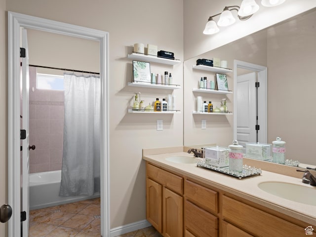 bathroom featuring tile patterned floors, double vanity, shower / bath combination with curtain, and a sink