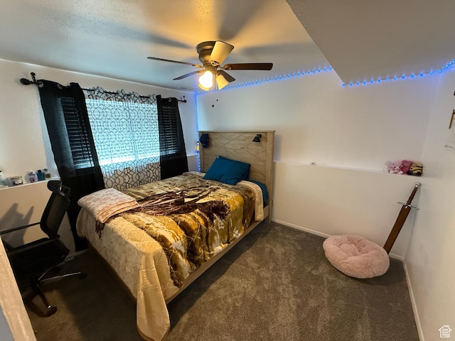 bedroom with carpet flooring, baseboards, and ceiling fan