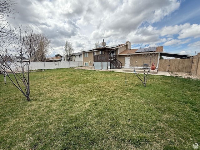 view of yard featuring a patio area and a fenced backyard