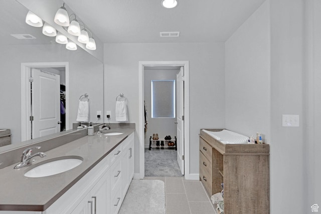 3219 W 3825 S, West Haven, UT 84401 - full bathroom with double vanity, a sink, tile patterned flooring, and visible vents