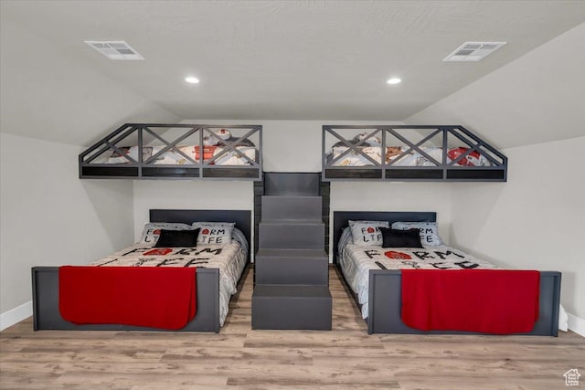 444 S 1530 W, Hurricane, UT 84737 - bedroom with visible vents, wood finished floors, and lofted ceiling