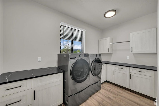444 S 1530 W, Hurricane, UT 84737 - laundry room with light wood-style floors, cabinet space, and washer and clothes dryer