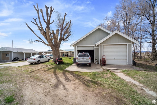 5801 S 7100 W, Hooper, UT 84315 - view of front facade with a garage and driveway