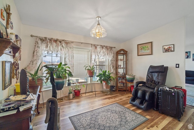 5801 S 7100 W, Hooper, UT 84315 - sitting room with a chandelier, wood finished floors, and vaulted ceiling