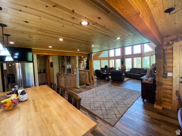 interior space featuring recessed lighting, wooden ceiling, wood finished floors, and rustic walls